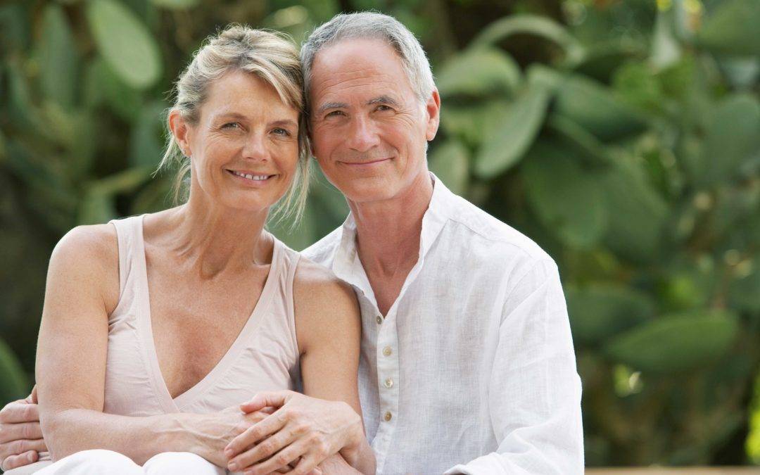 image of smiling middle aged couple for the blog How to Avoid a Late-Life Divorce